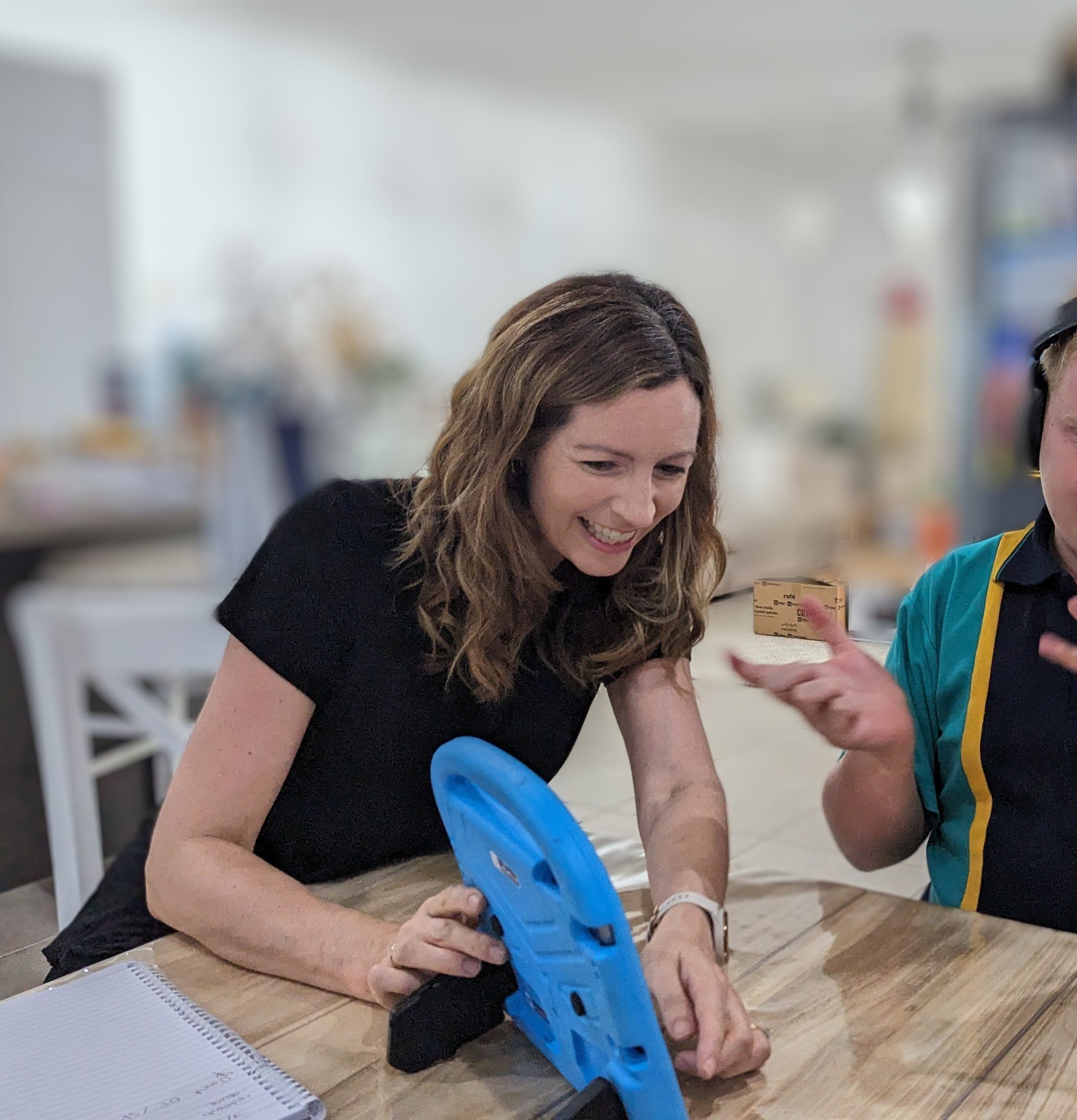 Aoife engaging with a child during a therapy session